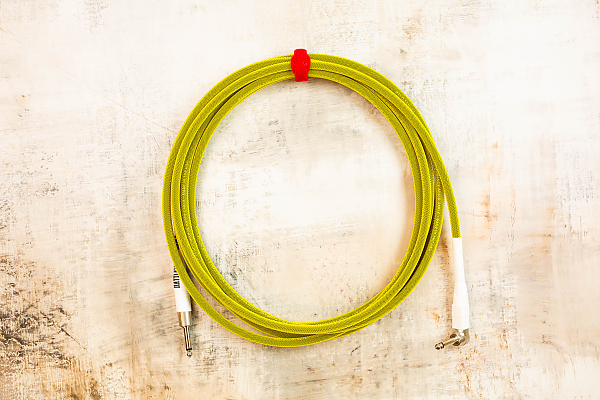 15' Standard in Curry with Neutrik Straight Nickel to Neutrik Right Angle Nickel (White Shrink Tubes)